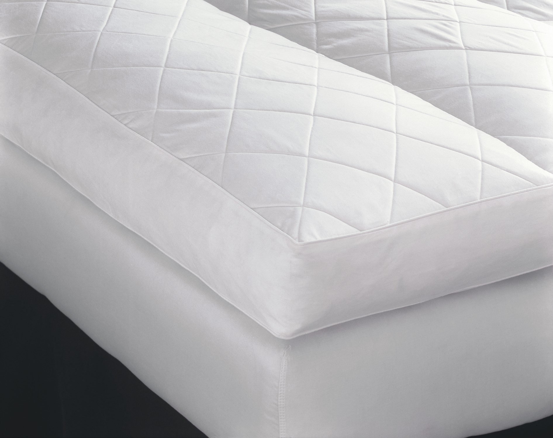 featherbed vs mattress topper